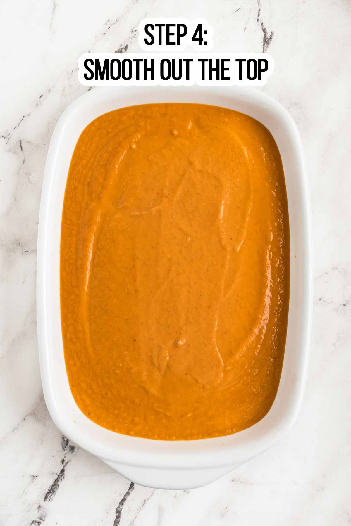 overhead view of pumpkin filling in white dish