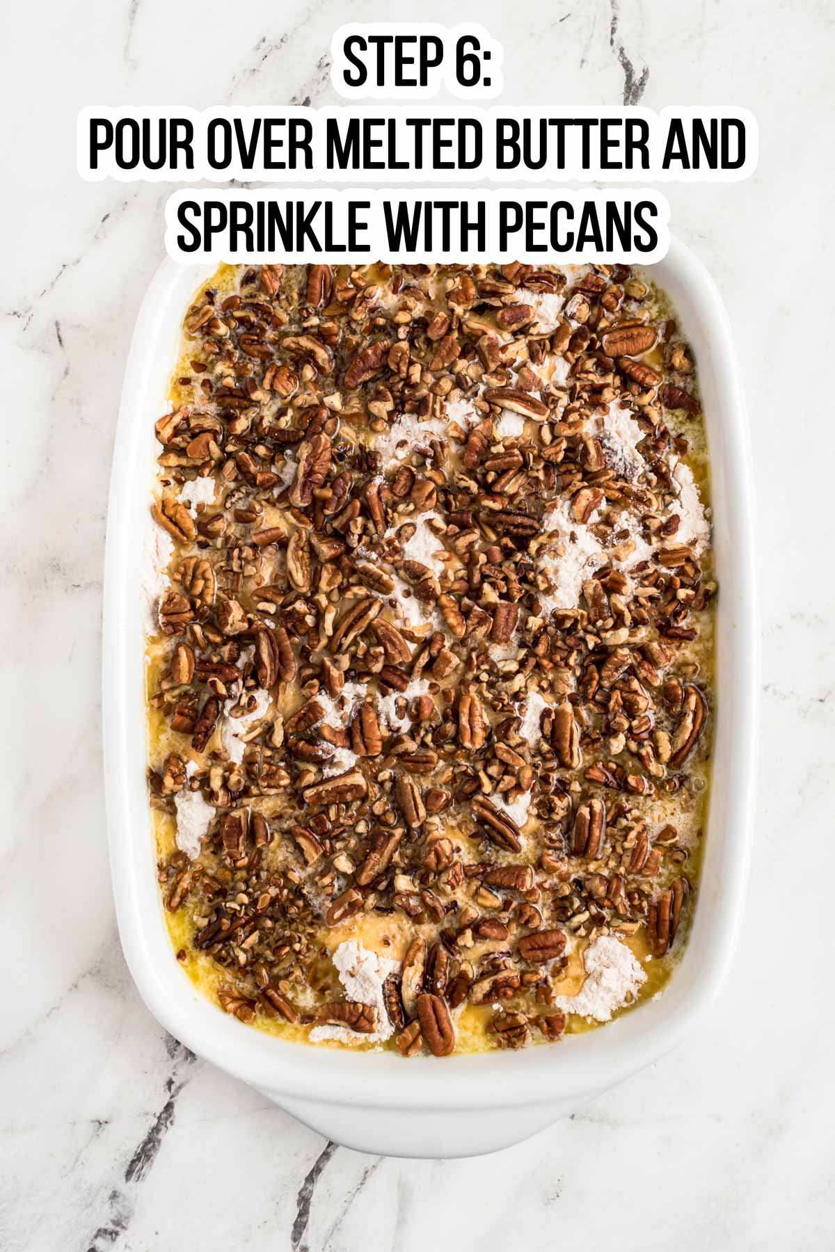 overhead view of unbaked pumpkin dump cake