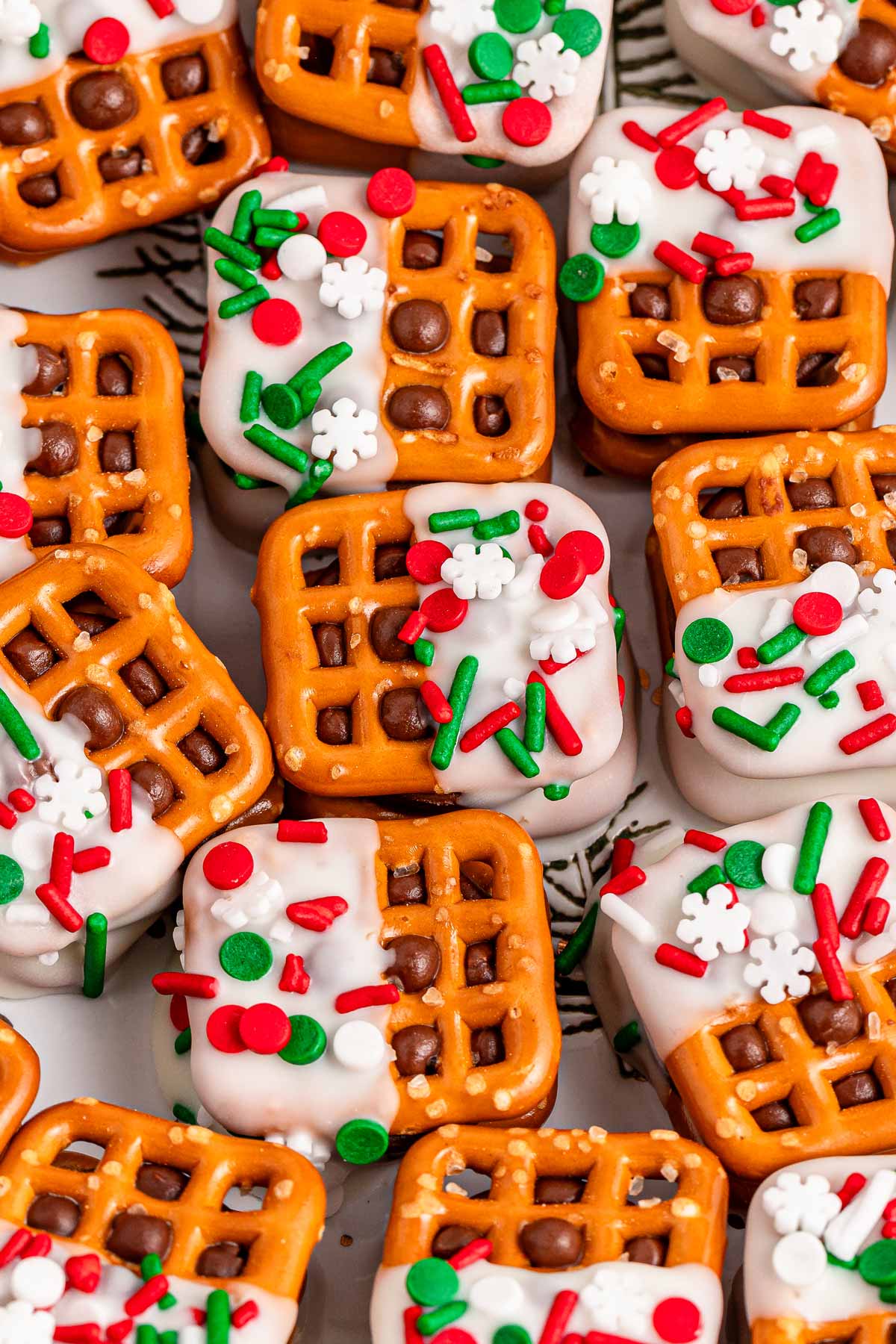 overhead view of decorated pretzel Rolos on white plate