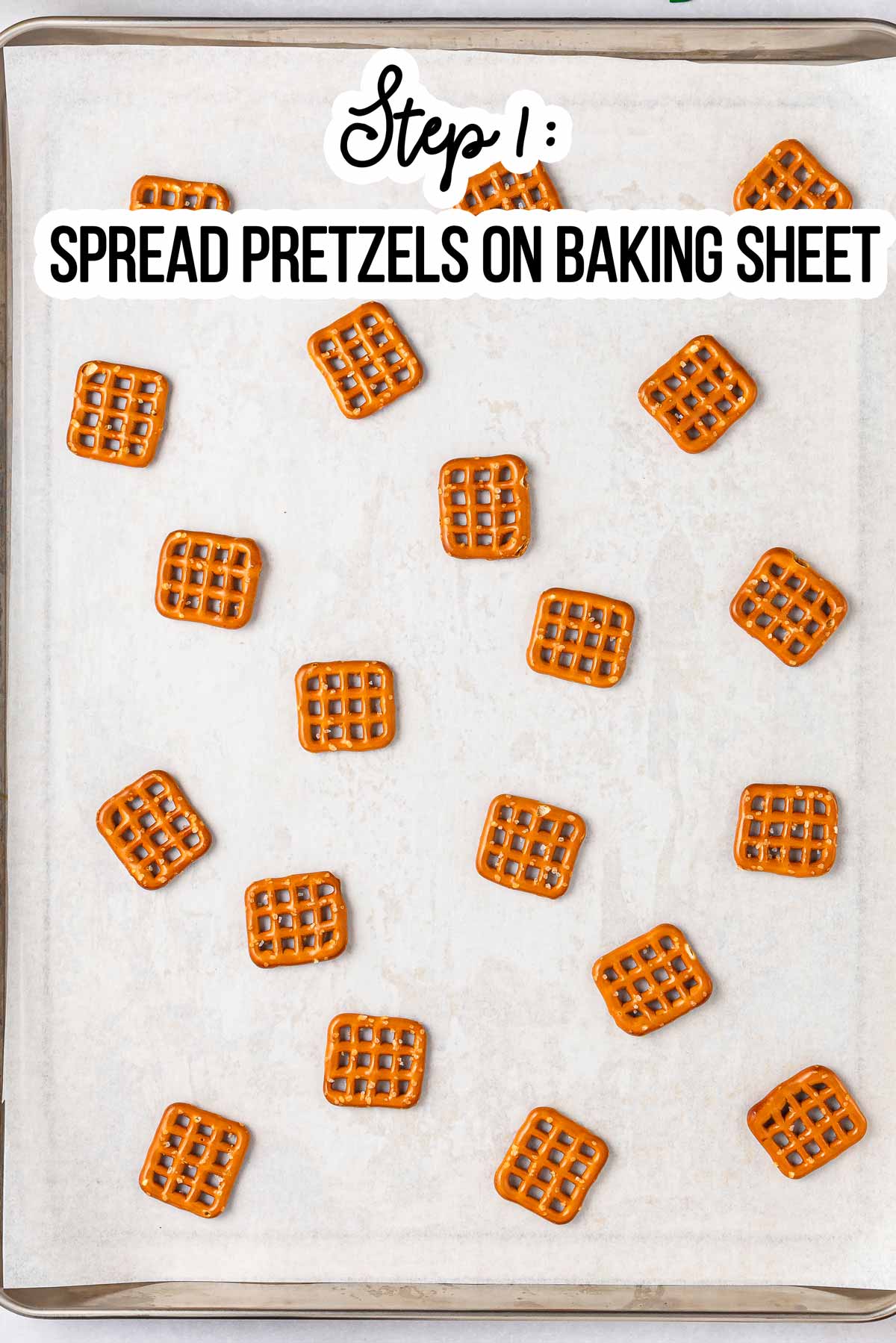 overhead view of pretzel shapes on lined baking parchment